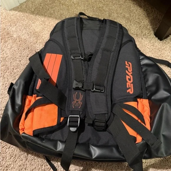 Orange and Black Spyder snow backpack. - Picture 3 of 7